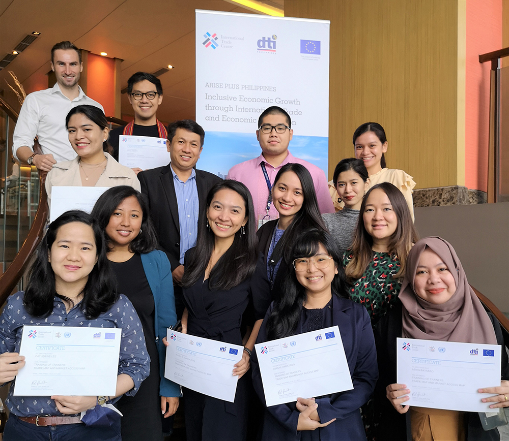 Group of people holding in hands certificates